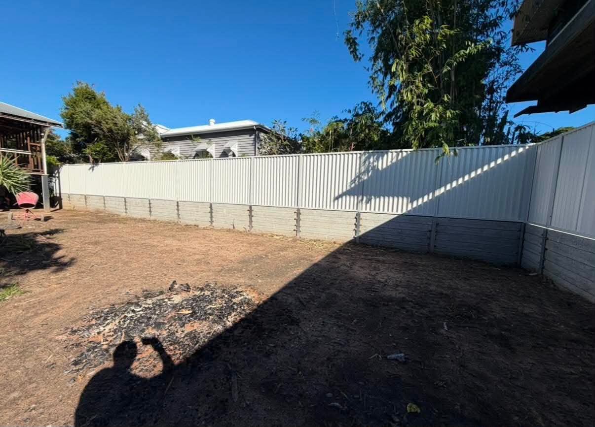 Cleared rear boundary before Colorbond fence installation