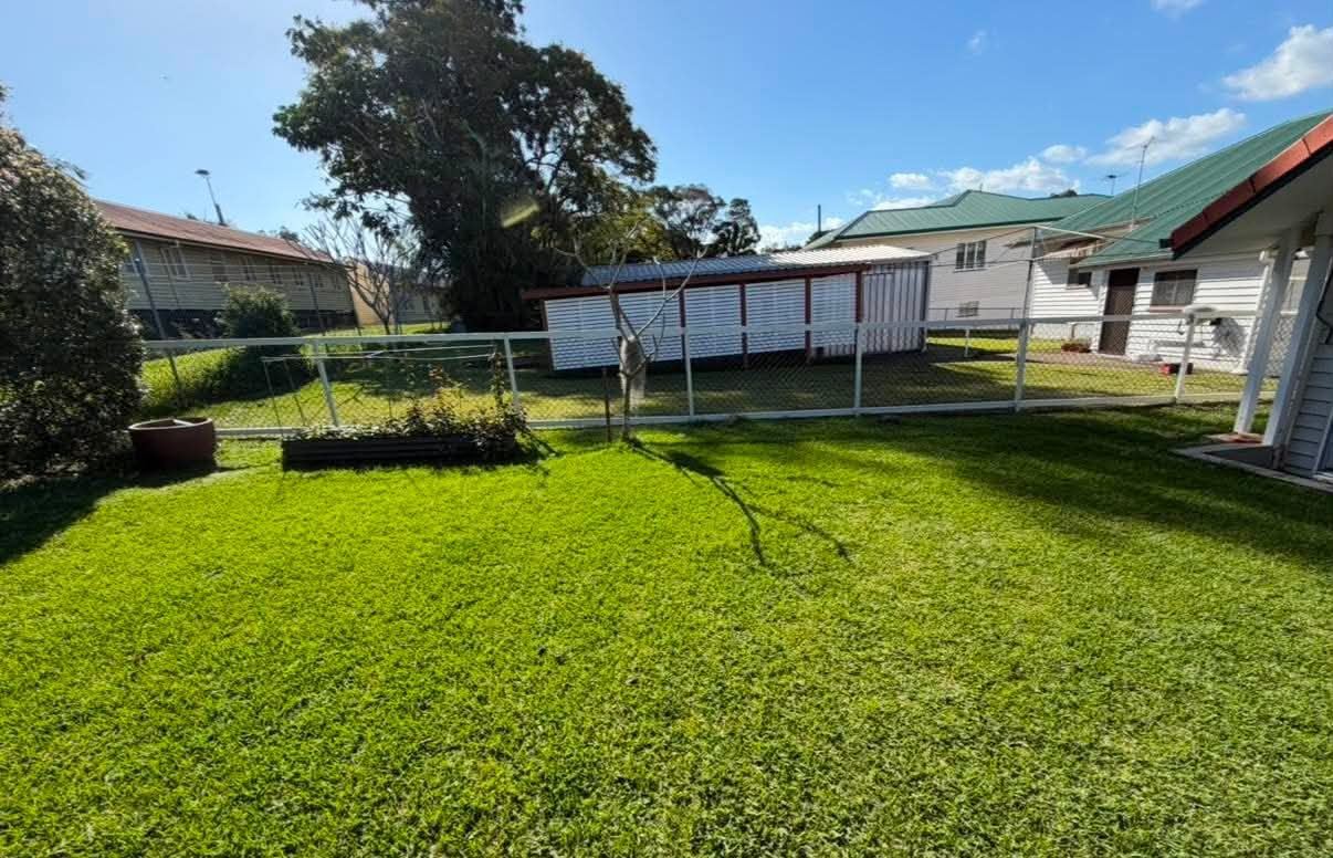 Driveway approach and vegetation near the work area