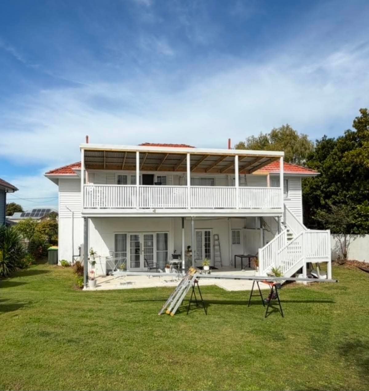 Wide view of the Queenslander deck, roof structure and staircase
