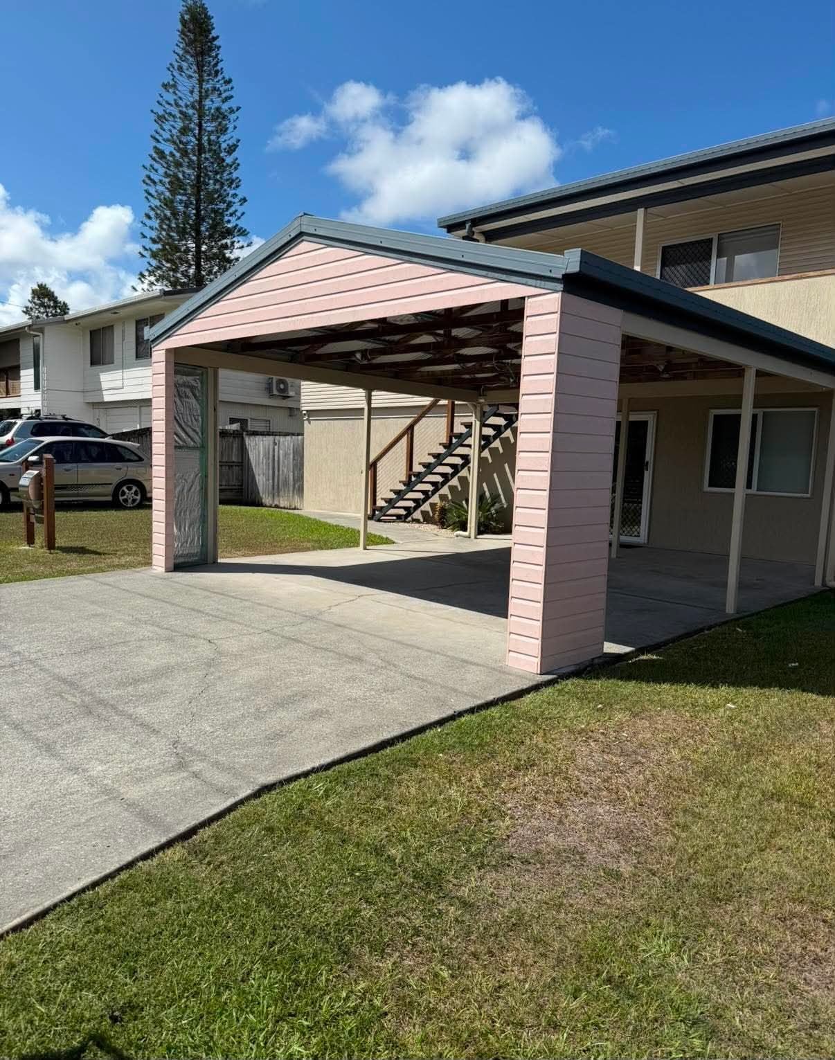 Finished carport with timber frame, steel posts and sheet roof